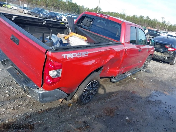 2014 Toyota Tundra 4WD Truck SR with VIN 5TFUW5F18EX399641, listed as a IAAI auction lot 41192704 with NaN miles. Bid and sale history available at carsss.com. Image 4.