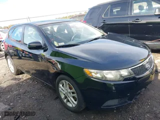 2012 Kia Forte 5-Door EX with VIN KNAFU5A29C5593082, listed as a IAAI auction lot 40940174 with 167,666 mi miles. Bid and sale history available at carsss.com. Image 1.