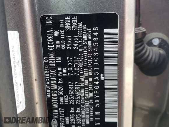 2018 Kia Sorento LX z VIN 5XYPG4A31JG345348, wystawiony jako Copart lot #55413455 z przebiegiem 64 868 mil mil oraz Szkoda całkowita • Salvage title. Historia ofert i sprzedaży dostępna na DreamBid. Obrazek 13.