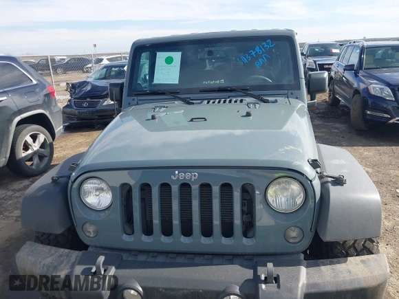 2014 Jeep Wrangler Unlimited Sport with VIN 1C4BJWDG9EL309763, listed as a IAAI auction lot 41378132 with 117,029 mi miles. Bid and sale history available at carsss.com. Image 12.