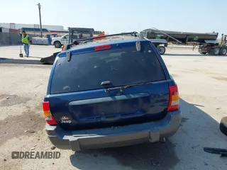 2000 Jeep Grand Cherokee Laredo with VIN 1J4G248S5YC413977, listed as a IAAI auction lot 42045808 with Not provided miles and . Bid and sale history available at DreamBid. Image 16.