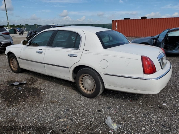 2002 Lincoln Town Car Executive with VIN 1LNHM81W82Y609104, listed as a Copart auction lot 75442374 with 324,612 mi miles and Salvage Title. Bid and sale history available at carsss.com. Image 2.