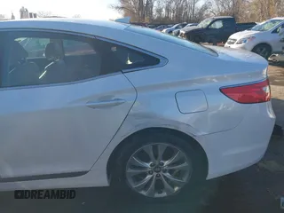 2014 Hyundai Azera with VIN KMHFG4JG6EA354949, listed as a IAAI auction lot 41034372 with 173,338 mi miles and . Bid and sale history available at DreamBid. Image 6.