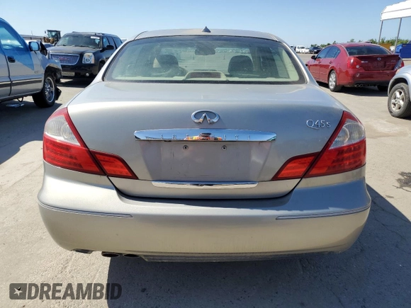 2006 Infiniti Q45 z VIN JNKBF01A46M800170, wystawiony jako Copart lot #57114275 z przebiegiem 197 502 mil mil oraz Tytuł czysty. Historia ofert i sprzedaży dostępna na DreamBid. Obrazek 6.