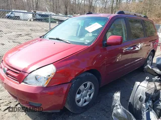 2008 Kia Sedona LX with VIN KNDMB233186262678, listed as a IAAI auction lot 41854128 with 143,829 mi miles. Bid and sale history available at carsss.com. Image 2.