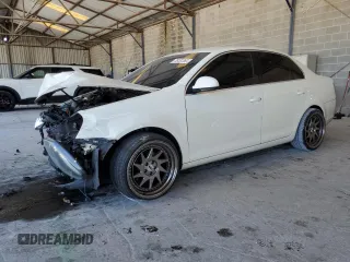 2005 Volkswagen Jetta z VIN 3VWRT71K75M627089, wystawiony jako Copart lot #53720555 z przebiegiem 262 440 mil mil oraz Nie do naprawy • Non repairable. Historia ofert i sprzedaży dostępna na DreamBid. Obrazek 1.