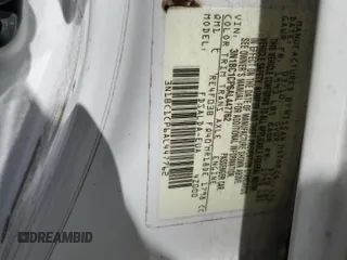 2010 Nissan Versa S z VIN 3N1BC1CP6AL447762, wystawiony jako Copart lot #53617295 z przebiegiem 165 846 mil mil oraz Szkoda całkowita • Salvage title. Historia ofert i sprzedaży dostępna na DreamBid. Obrazek 15.