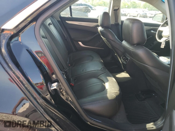 2013 Cadillac CTS Luxury z VIN 1G6DE5E53D0162640, wystawiony jako Copart lot #53890025 z przebiegiem 129 488 mil mil oraz Szkoda całkowita • Salvage title. Historia ofert i sprzedaży dostępna na DreamBid. Obrazek 10.