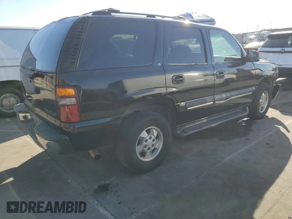 2002 Chevrolet Tahoe LS with VIN 1GNEC13V62R244378, listed as a Copart auction lot 84209834 with 350,780 mi miles and Salvage Title. Bid and sale history available at carsss.com. Image 3.