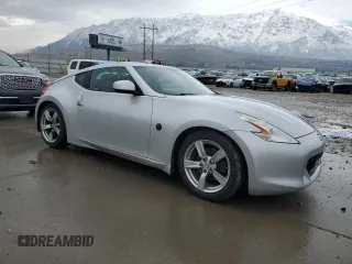 2009 Nissan 370Z Touring with VIN JN1AZ44E89M409220, listed as a Copart auction lot 43701504 with 145,099 mi miles and Salvage Title. Bid and sale history available at carsss.com. Image 4.