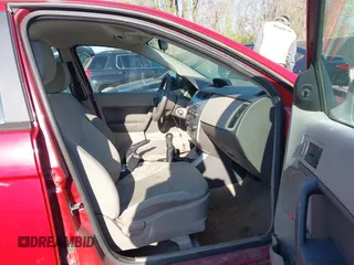 2010 Ford Focus S with VIN 1FAHP3ENXAW238107, listed as a IAAI auction lot 41974240 with 123,777 mi miles and . Bid and sale history available at carsss.com. Image 5.