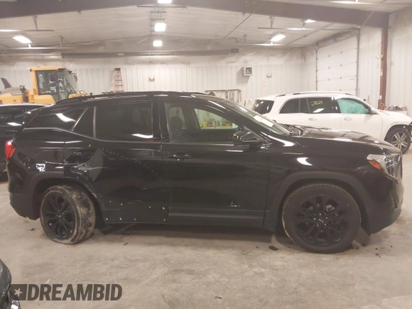 2019 GMC Terrain SLE z VIN 3GKALMEV0KL239503, wystawiony jako IAAI lot #41923480 z przebiegiem 94 070 mil mil oraz . Historia ofert i sprzedaży dostępna na DreamBid. Obrazek 13.