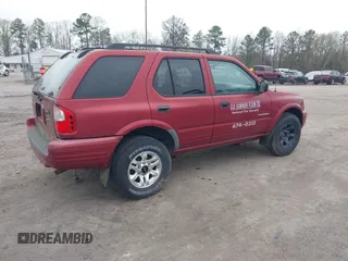 2004 Isuzu Rodeo S z VIN 4S2CK58W644317345, wystawiony jako IAAI lot #41940961 z przebiegiem Nie podano mil oraz . Historia ofert i sprzedaży dostępna na DreamBid. Obrazek 4.