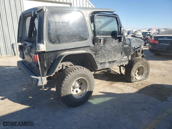 2004 Jeep Wrangler Sport with VIN 1J4FA49S64P717397, listed as a Copart auction lot 82970994 with 0 mi miles and Salvage Title. Bid and sale history available at carsss.com. Image 3.