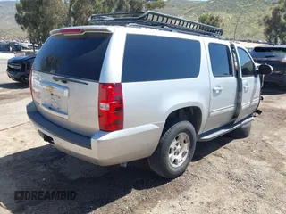 2013 Chevrolet Suburban LT with VIN 1GNSCJE06DR138925, listed as a IAAI auction lot 42008011 with 236,244 mi miles. Bid and sale history available at carsss.com. Image 4.