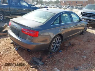 2014 Audi A6 Premium Plus z VIN WAUDFAFC7EN087684, wystawiony jako IAAI lot #41409408 z przebiegiem 69 916 mil mil oraz . Historia ofert i sprzedaży dostępna na DreamBid. Obrazek 4.