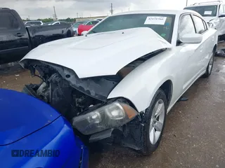 2013 Dodge Charger SE z VIN 2C3CDXBG0DH531483, wystawiony jako IAAI lot #42131266 z przebiegiem Nie podano mil oraz . Historia ofert i sprzedaży dostępna na DreamBid. Obrazek 17.