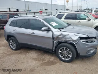 2019 Jeep Cherokee Latitude Plus with VIN 1C4PJLLB5KD128613, listed as a IAAI auction lot 42086514 with 131,557 mi miles. Bid and sale history available at carsss.com. Image 13.