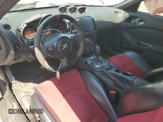 2015 Nissan 370Z Nismo z VIN JN1AZ4EH3FM441254, wystawiony jako Copart lot #52646145 z przebiegiem 74 303 mil mil oraz Szkoda całkowita • Salvage title. Historia ofert i sprzedaży dostępna na DreamBid. Obrazek 8.