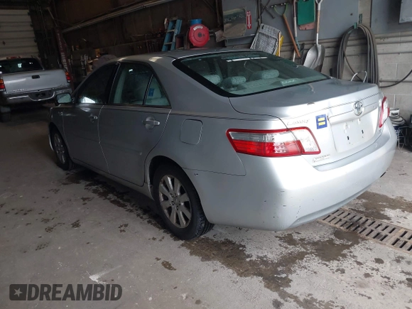 2007 Toyota Camry z VIN JTNBB46K973038138, wystawiony jako IAAI lot #42233680 z przebiegiem 230 480 mil mil oraz . Historia ofert i sprzedaży dostępna na DreamBid. Obrazek 3.