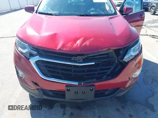 2021 Chevrolet Equinox LT z VIN 2GNAXUEV2M6108703, wystawiony jako IAAI lot #41965639 z przebiegiem 122 160 mil mil oraz . Historia ofert i sprzedaży dostępna na DreamBid. Obrazek 6.