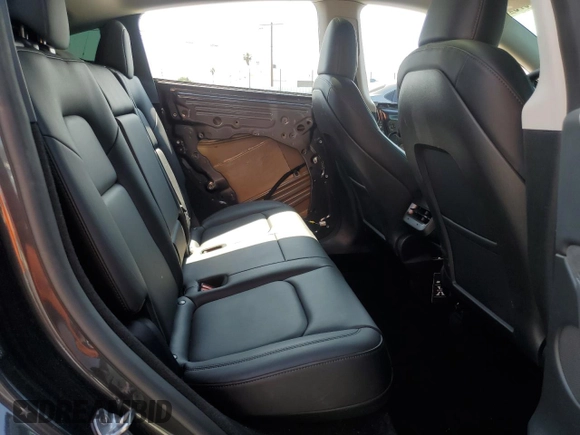 2024 Tesla Model Y Long Range z VIN 7SAYGDEE0RF024326, wystawiony jako Copart lot #52149675 z przebiegiem 34 503 mil mil oraz Szkoda całkowita • Salvage title. Historia ofert i sprzedaży dostępna na DreamBid. Obrazek 11.