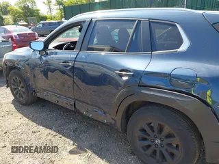 2024 Mazda CX-50 S Preferred with VIN 7MMVABBM3RN233207, listed as a IAAI auction lot 42395310 with 7,544 mi miles and . Bid and sale history available at DreamBid. Image 6.