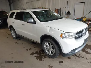 2012 Dodge Durango SXT with VIN 1C4RDJAGXCC295138, listed as a IAAI auction lot 42333094 with 96,581 mi miles and . Bid and sale history available at DreamBid. Image 1.