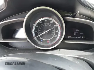 2014 Mazda 3 i Grand Touring z VIN JM1BM1M75E1151329, wystawiony jako IAAI lot #42248334 z przebiegiem 138 748 mil mil oraz . Historia ofert i sprzedaży dostępna na DreamBid. Obrazek 7.