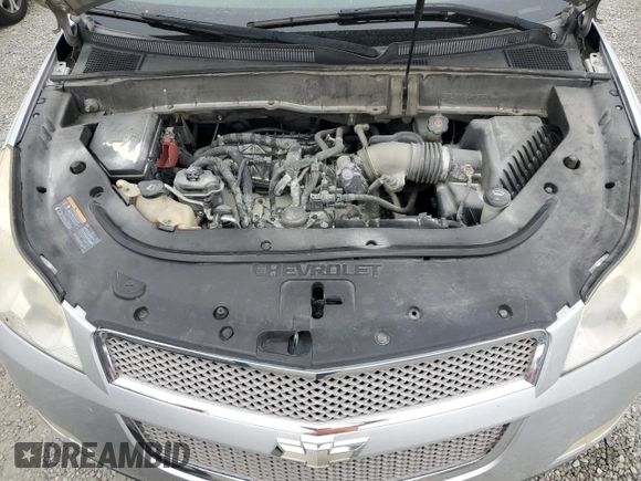 2012 Chevrolet Traverse LTZ z VIN 1GNKRLED8CJ262091, wystawiony jako Copart lot #55527805 z przebiegiem Nie podano mil oraz Szkoda całkowita • Salvage title. Historia ofert i sprzedaży dostępna na DreamBid. Obrazek 12.