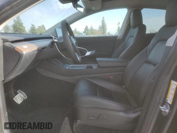 2022 Tesla Model Y Performance with VIN 7SAYGDEF3NF490643, listed as a Copart auction lot 46975825 with 50,792 mi miles and Salvage Title. Bid and sale history available at DreamBid. Image 7.
