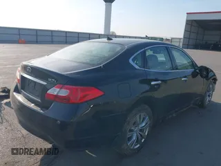 2013 Infiniti M with VIN JN1BY1AR3DM600436, listed as a IAAI auction lot 42031696 with 114,637 mi miles and . Bid and sale history available at DreamBid. Image 4.