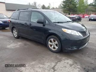 2014 Toyota Sienna LE AAS with VIN 5TDKK3DC0ES487830, listed as a IAAI auction lot 42216342 with 155,973 mi miles. Bid and sale history available at carsss.com. Image 1.
