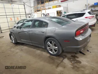 2012 Dodge Charger SXT with VIN 2C3CDXJG2CH154140, listed as a Copart auction lot 85696734 with 183,721 mi miles and Salvage Title. Bid and sale history available at carsss.com. Image 2.
