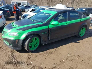 2009 Pontiac G8 with VIN 6G2ER57739L172831, listed as a IAAI auction lot 41662818 with 145,900 mi miles. Bid and sale history available at carsss.com. Image 2.