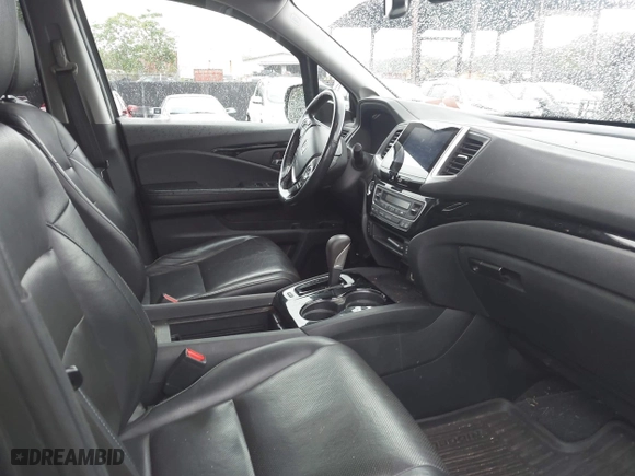 2017 Honda Ridgeline RTL-E with VIN 5FPYK3F76HB034774, listed as a IAAI auction lot 41754824 with 67,451 mi miles. Bid and sale history available at carsss.com. Image 5.