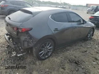 2019 Mazda 3 with VIN JM1BPAJMXK1119912, listed as a Copart auction lot 59708825 with 50,459 mi miles and Salvage title. Bid and sale history available at DreamBid. Image 3.