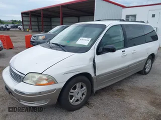 2003 Ford Windstar SEL with VIN 2FMZA53423BA93926, listed as a IAAI auction lot 42537144 with 131,149 mi miles and . Bid and sale history available at DreamBid. Image 2.