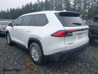2024 Toyota Grand Highlander Hybrid XLE with VIN 5TDACAB50RS009866, listed as a IAAI auction lot 41976658 with 76,390 mi miles. Bid and sale history available at carsss.com. Image 3.