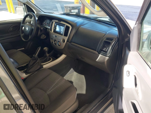 2006 Mazda Tribute i with VIN 4F2YZ02Z26KM12180, listed as a IAAI auction lot 41959606 with 228,217 mi miles and . Bid and sale history available at DreamBid. Image 5.