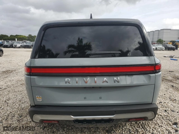 2024 Rivian R1S Adventure with VIN 7PDSGABA1RN031380, listed as a Copart auction lot 73119354 with 6,786 mi miles and Salvage Title. Bid and sale history available at carsss.com. Image 6.