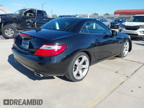 2012 Mercedes-Benz SLK-Class SLK 350 with VIN WDDPK5HA9CF036523, listed as a IAAI auction lot 41663366 with 65,722 mi miles. Bid and sale history available at carsss.com. Image 4.