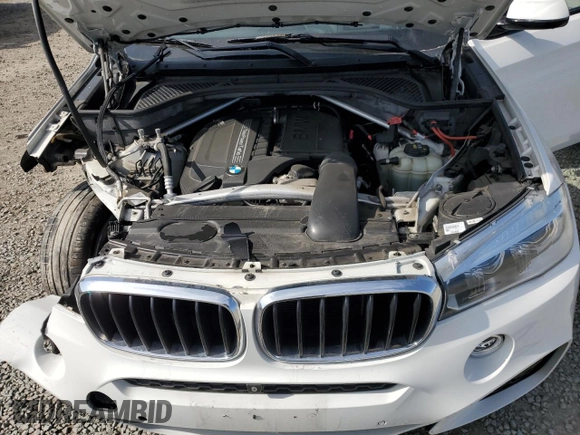 2017 BMW X6 sDrive35i z VIN 5UXKU0C36H0G68031, wystawiony jako Copart lot #52830915 z przebiegiem 67 224 mil mil oraz Szkoda całkowita • Salvage title. Historia ofert i sprzedaży dostępna na DreamBid. Obrazek 12.