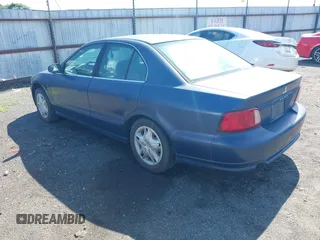 2002 Mitsubishi Galant ES z VIN 4A3AA46H42E070139, wystawiony jako IAAI lot #42162751 z przebiegiem 260 885 mil mil oraz . Historia ofert i sprzedaży dostępna na DreamBid. Obrazek 3.