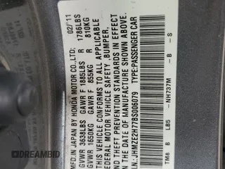 2011 Honda Insight EX with VIN JHMZE2H77BS006079, listed as a Copart auction lot 63873985 with 134,159 mi miles and Salvage title. Bid and sale history available at DreamBid. Image 12.