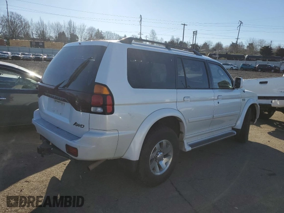 2003 Mitsubishi Montero z VIN JA4MT41RX3J013246, wystawiony jako Copart lot #42210545 z przebiegiem 188 387 mil mil oraz Szkoda całkowita • Salvage title. Historia ofert i sprzedaży dostępna na DreamBid. Obrazek 3.