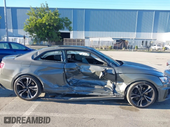 2023 Audi S5 Premium Plus with VIN WAUP4AF58PA001748, listed as a IAAI auction lot 41194878 with 33,877 mi miles and . Bid and sale history available at DreamBid. Image 13.