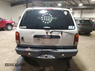 2000 Ford Explorer XLT с VIN 1FMZU83PXYZA51396, выставлен на аукционе Copart как лот 62365505 с пробегом 230 018 миль миль и Списание • Salvage title. История ставок и продаж доступна на DreamBid. Изображение 6.