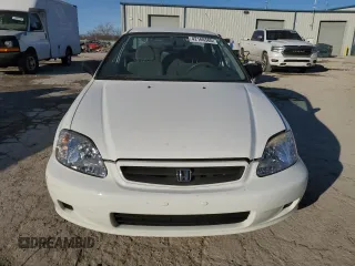 1999 Honda Civic DX with VIN 1HGEJ6120XL031958, listed as a Copart auction lot 42166565 with 69,457 mi miles and Clean Title. Bid and sale history available at carsss.com. Image 5.