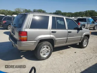 1998 Jeep Grand Cherokee Limited with VIN 1J4GZ78S5WC325148, listed as a Copart auction lot 67780424 with 0 mi miles and Salvage Title. Bid and sale history available at carsss.com. Image 3.